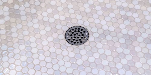 How to clean a shower drain before it turns into a major clog headache