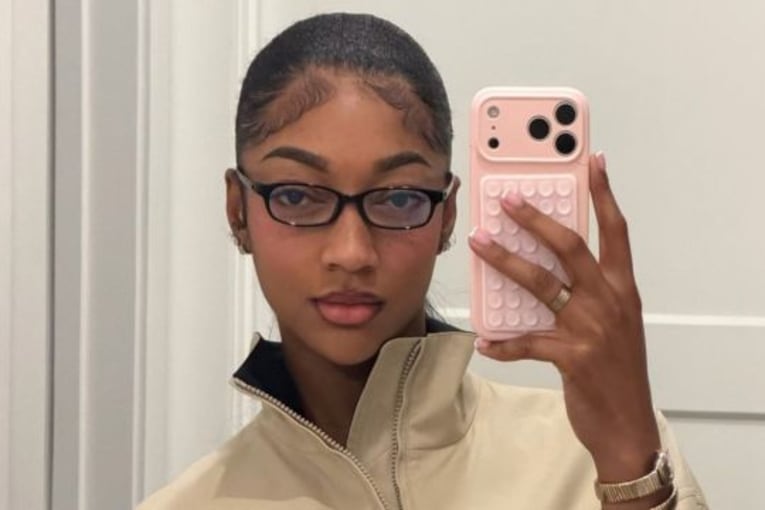 Angel Reese elevates cutout top and micro shorts with Reebok sneakers