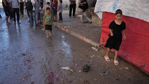 An Israeli strike on a funeral in Gaza kills 7 people and wounds 22, a local hospital says