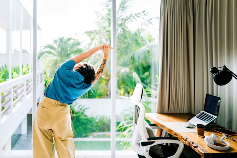 6 easy ways to move more while working from home, according to a personal trainer