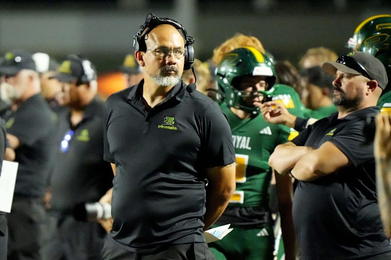 California high school football coach fired after kicking football at player